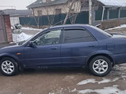 Mazda 323 2001 года за 1 600 000 тг. в Алматы – фото 4