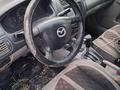 Mazda 323 2001 года за 1 600 000 тг. в Алматы – фото 5