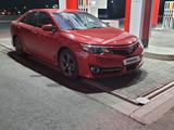 Toyota Camry 2012 года за 8 400 000 тг. в Актобе