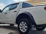 Mitsubishi L200 2012 года за 8 800 000 тг. в Атырау – фото 2