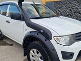 Mitsubishi L200 2012 года за 8 800 000 тг. в Атырау – фото 4
