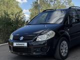Suzuki SX4 2008 года за 3 300 000 тг. в Караганда – фото 2