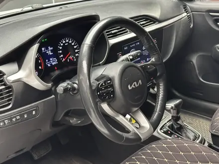 Kia Rio 2022 года за 7 500 000 тг. в Актобе – фото 13