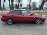 Mitsubishi Lancer 2005 года за 1 400 000 тг. в Шымкент – фото 3