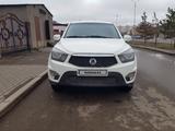 SsangYong Nomad 2013 года за 6 200 000 тг. в Астана – фото 3