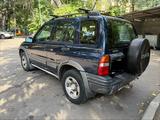 Suzuki Grand Vitara 2004 годаүшін2 800 000 тг. в Алматы – фото 4