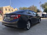 Toyota Camry 2013 года за 8 300 000 тг. в Кульсары – фото 4