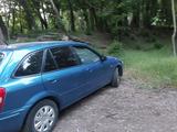 Mazda 323 2000 года за 2 000 000 тг. в Турара Рыскулова – фото 2