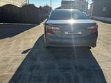 Toyota Camry 2013 года за 7 600 000 тг. в Жанаозен – фото 4