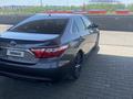 Toyota Camry 2015 года за 8 000 000 тг. в Кульсары – фото 2