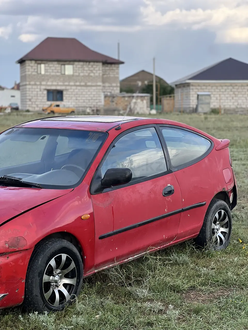 Mazda 323, 1998