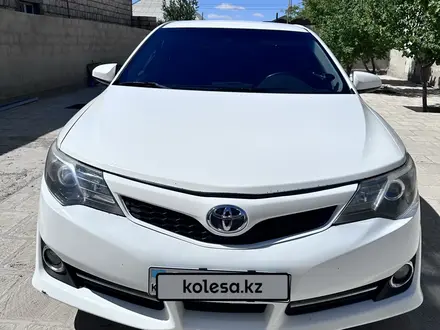 Toyota Camry 2013 года за 7 500 000 тг. в Жанаозен