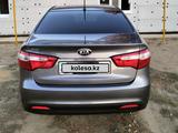 Kia Rio 2013 года за 4 800 000 тг. в Актобе – фото 3