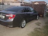 Toyota Camry 2014 года за 7 900 000 тг. в Уральск – фото 2