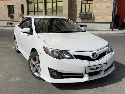 Toyota Camry 2013 года за 6 800 000 тг. в Атырау