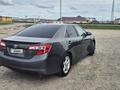 Toyota Camry 2014 года за 6 200 000 тг. в Уральск – фото 2