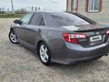 Toyota Camry 2014 года за 6 200 000 тг. в Уральск