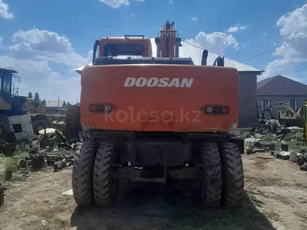 Doosan  DX140W 2010 года за 25 000 000 тг. в Шымкент