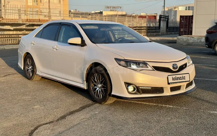 Toyota Camry 2014 года за 8 800 000 тг. в Атырау