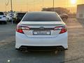 Toyota Camry 2014 года за 8 800 000 тг. в Атырау – фото 6