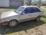 Mazda 323 1989 года за 400 000 тг. в Шымкент – фото 3