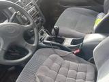 Toyota Carina E 1997 года за 1 900 000 тг. в Конаев (Капшагай) – фото 4