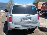 Infiniti QX56 2006 года за 4 800 000 тг. в Астана – фото 3