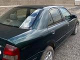 Mazda 323 1998 года за 1 450 000 тг. в Караганда – фото 2