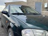 Mazda 323 1998 года за 1 450 000 тг. в Караганда – фото 5