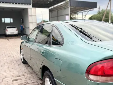 Mazda 626 1997 года за 1 650 000 тг. в Мерке – фото 6