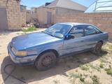 Mazda 626 1990 годаүшін300 000 тг. в Жанаозен – фото 2