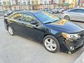 Toyota Camry 2014 года за 7 550 000 тг. в Атырау – фото 6