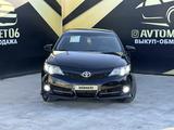 Toyota Camry 2013 года за 7 350 000 тг. в Атырау – фото 2