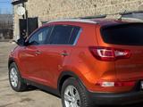 Kia Sportage 2012 года за 7 100 000 тг. в Караганда – фото 4