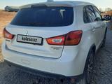 Mitsubishi Outlander Sport 2016 годаүшін7 500 000 тг. в Актобе