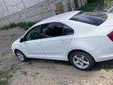 Skoda Rapid 2013 года за 3 500 000 тг. в Караганда – фото 2