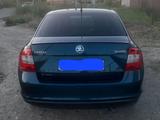 Skoda Rapid 2013 года за 4 300 000 тг. в Атырау – фото 2