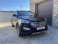 Hyundai Santa Fe 2016 года за 9 800 000 тг. в Атырау