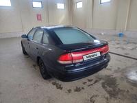 Mazda Cronos 1995 годаfor1 300 000 тг. в Шымкент