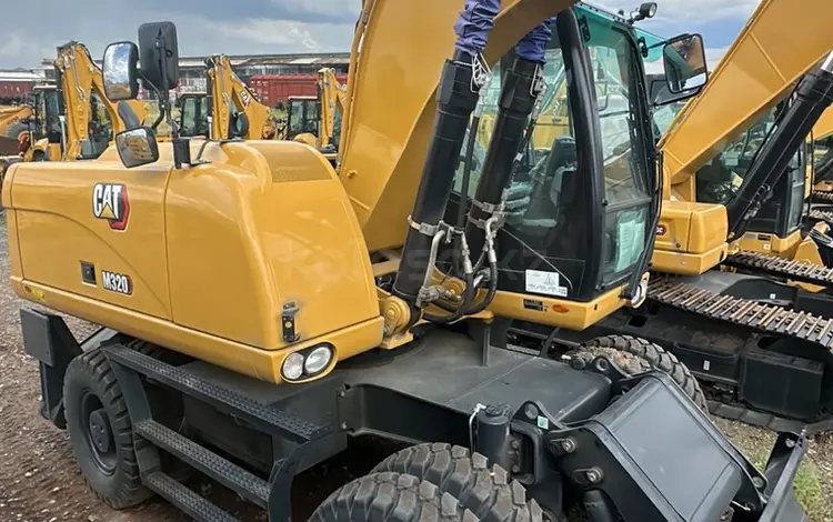 Колесный экскаватор CAT в Актобе