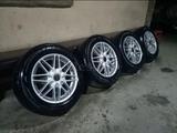 Шины с дисками зимние 215/60/16 состояние идеал за 94 500 тг. в Алматы – фото 2