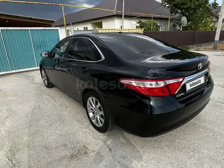 Toyota Camry 2015 года за 8 700 000 тг. в Атырау – фото 4