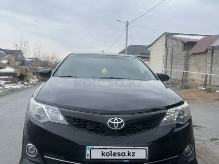 Toyota Camry 2014 года за 8 550 000 тг. в Шымкент