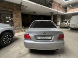 Mitsubishi Lancer 2007 годаfor3 500 000 тг. в Алматы – фото 2