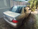 Mitsubishi Lancer 2007 года за 2 100 000 тг. в Шымкент – фото 2