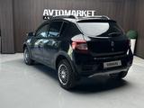 Renault Sandero 2015 года за 3 700 000 тг. в Актобе – фото 5
