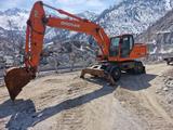 Doosan  DX210W 2010 года за 35 000 000 тг. в Алматы – фото 2