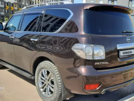 Nissan Patrol 2011 года за 11 000 000 тг. в Астана – фото 37