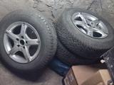 Шины 205/70 R15 с дискамиүшін200 000 тг. в Отеген-Батыр