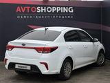 Kia Rio 2018 года за 7 500 000 тг. в Актобе – фото 5